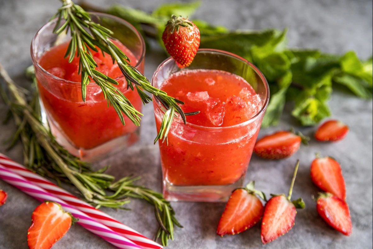 Fresh strawberry puree in a glass jar