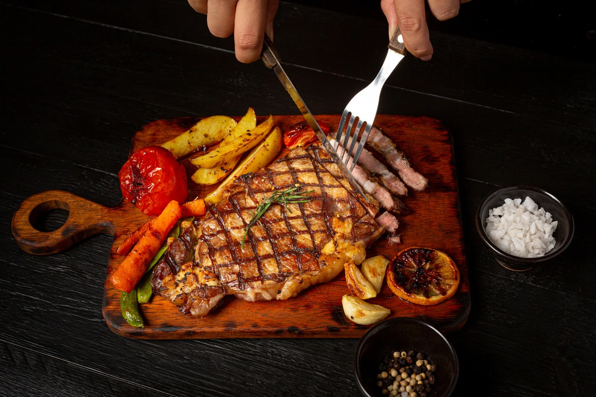 Perfectly grilled steak on a BBQ grill